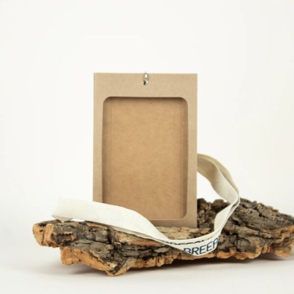 Low-waste conference and event name badge holder with kraft paper and organic cotton