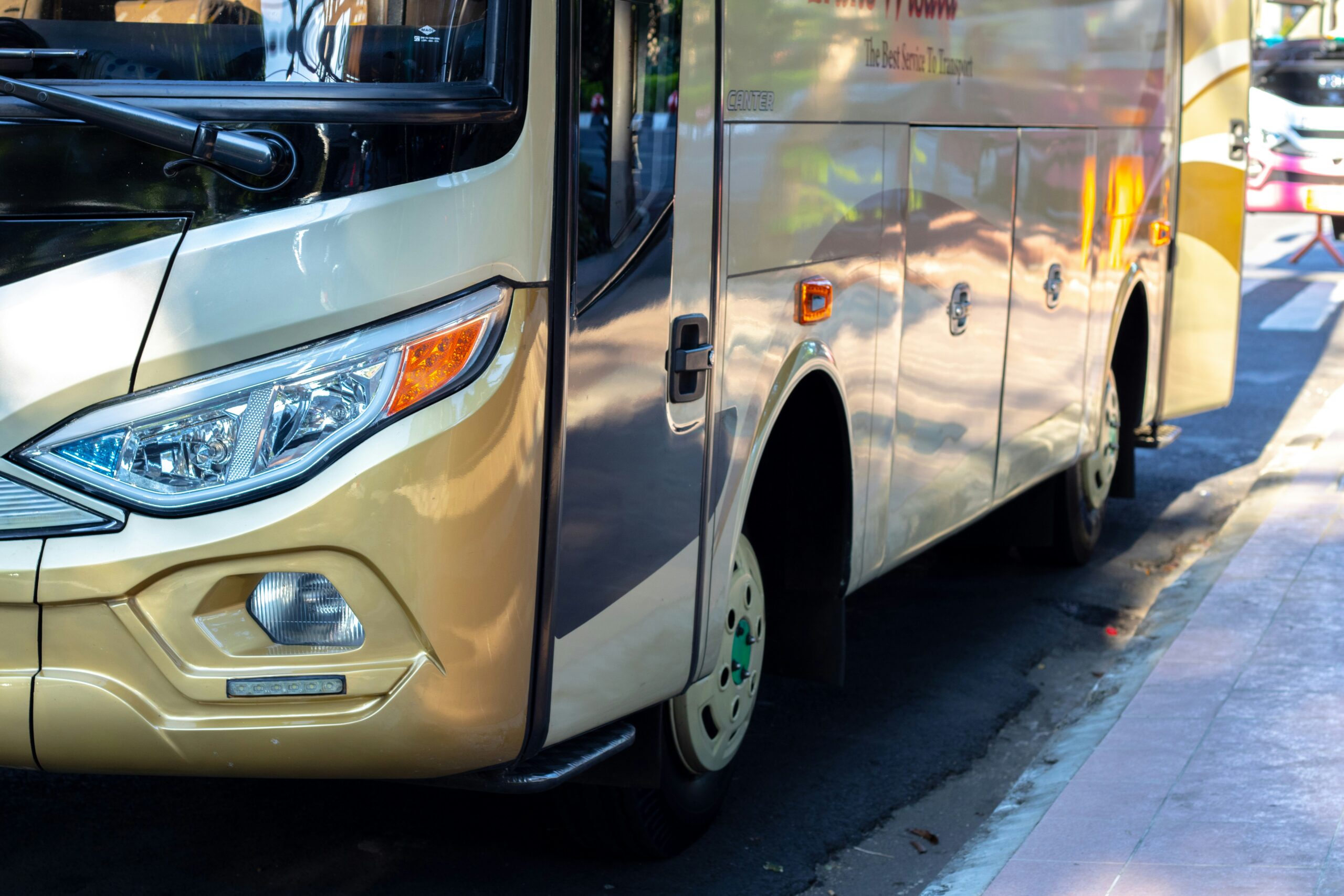 Close up of coach transportation for sustainable event. meeting and conference consulting