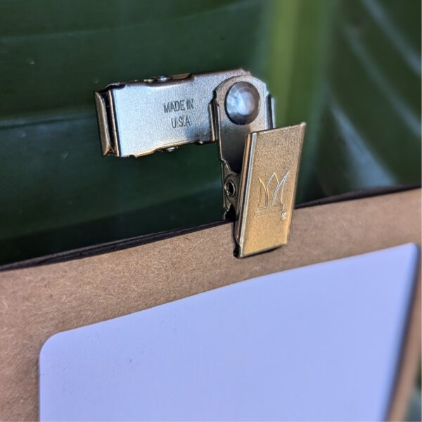 Close up of double, metal bulldog clip made in USA for eco-friendly event name tag and name badge product