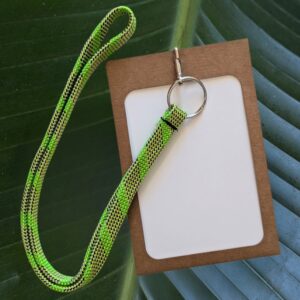 Upcycled, sustainable event lanyard made out of old climbing ropes with paper name badge holder.